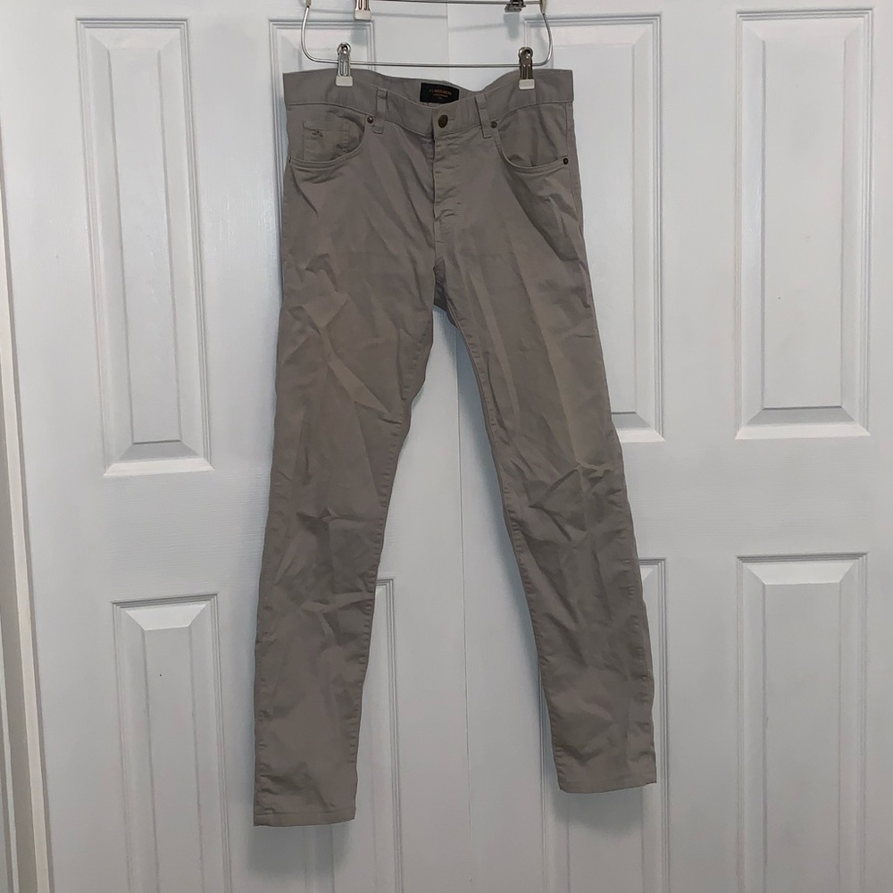 Men’s khaki tan pants, tailored fit.